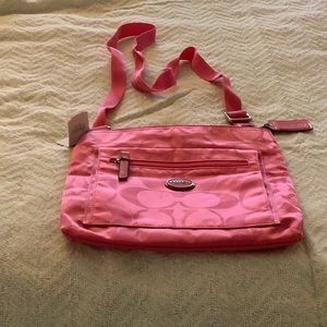 Nylon COACH crossbody purse.